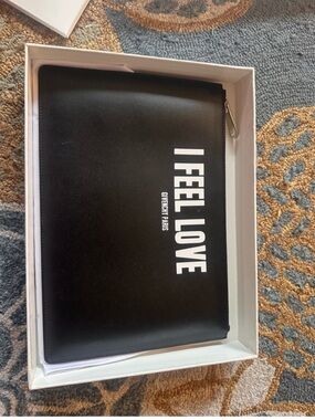 Givenchy Paris “ I feel love” zip up pouch